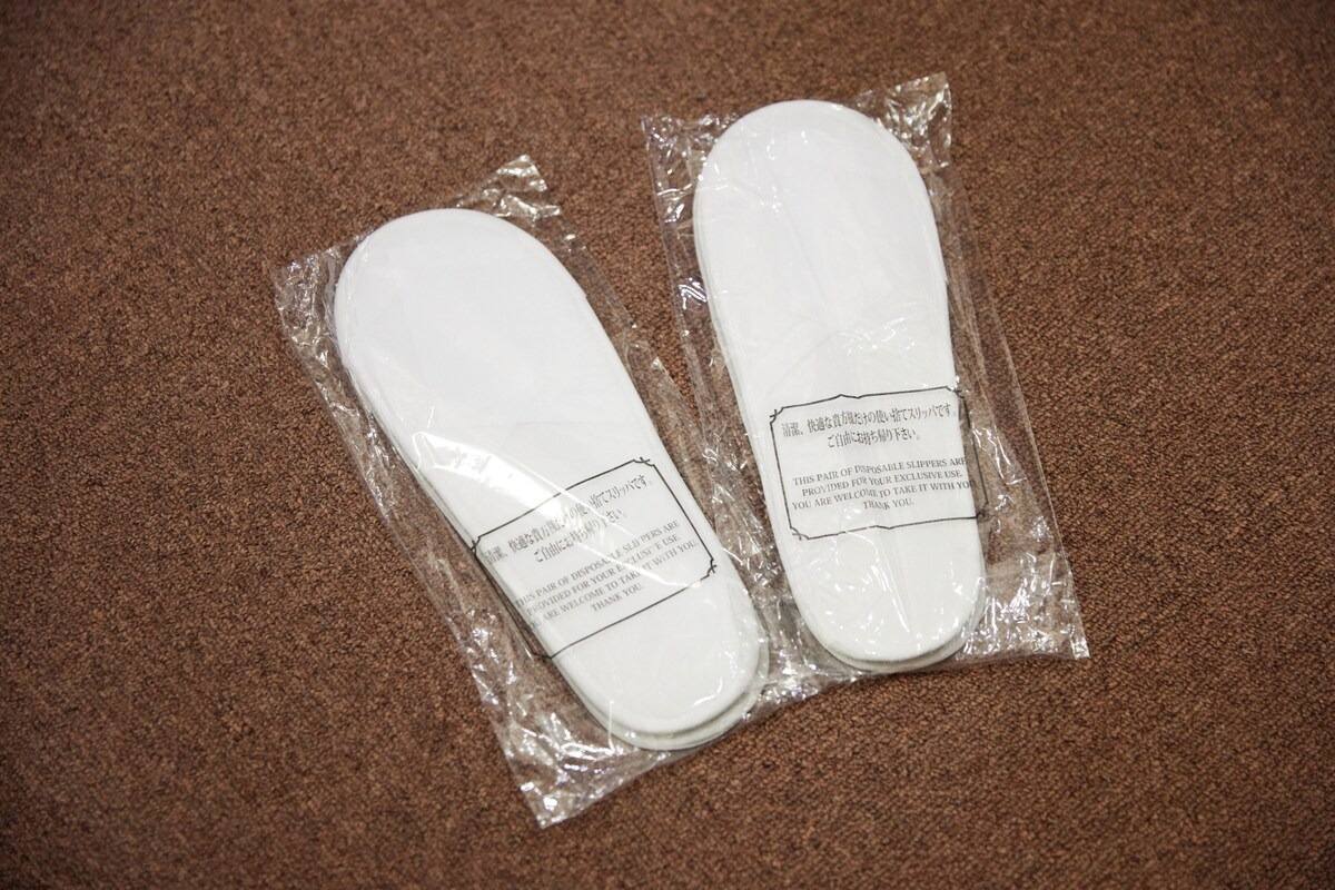 Wrapped slippers for guests